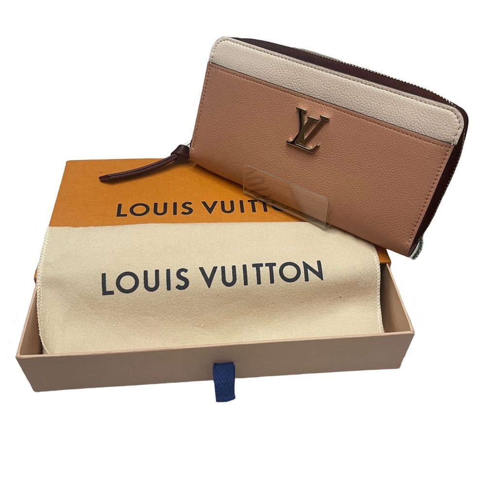 LOUIS VUITTON Zippy Lock Me Leather Wallet
